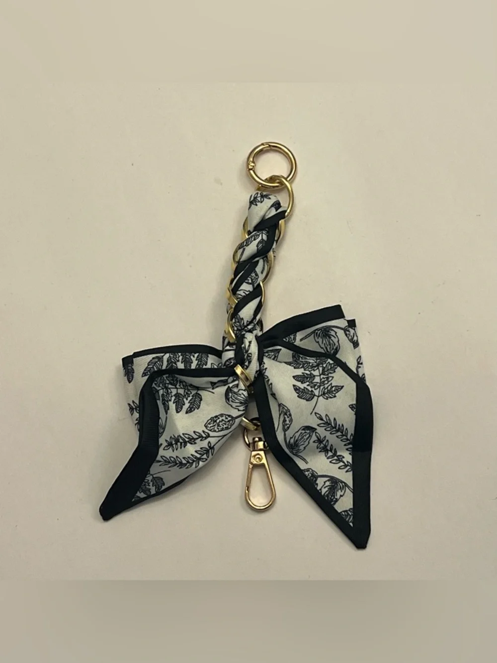 Bow tie Bag Charm (black and white, gold chain)‎